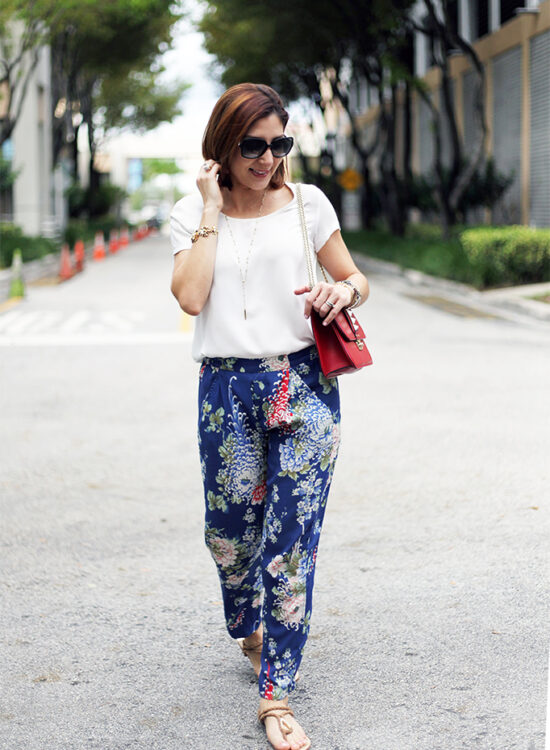 Blame it on Mei Miami Fashion Blogger Fall 2015 Bvlgari sunglasses Zara Floral Pants Henri Bendel Necklace Ring Tiffany Bracelet Valentino Rockstud Handbag Dolce Vita Sandals.jpg